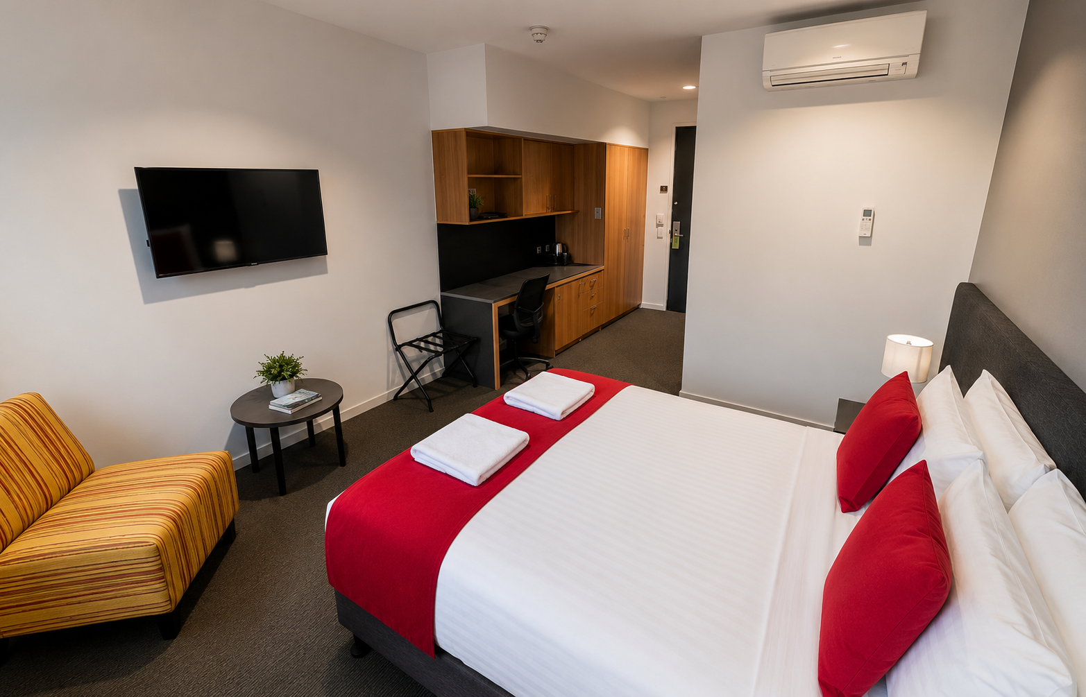 Gryphon House Room with a double bed, private ensuite bathroom, air conditioning, television, additional storage and high-speed Wi-Fi.